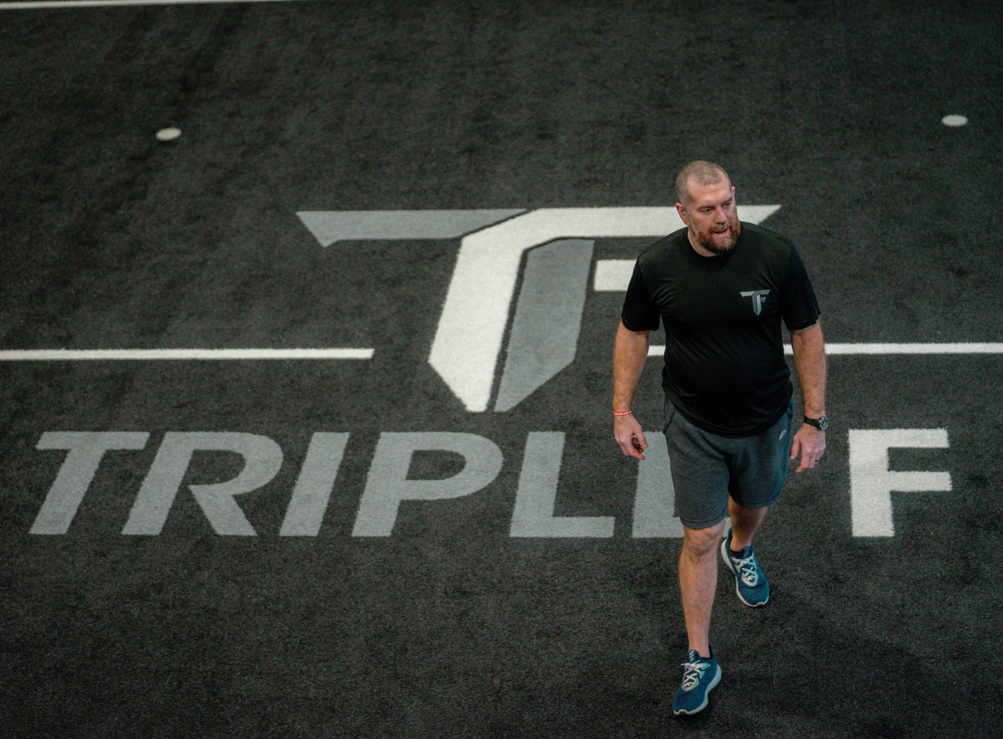 Lee Smith coaching inside Triple F